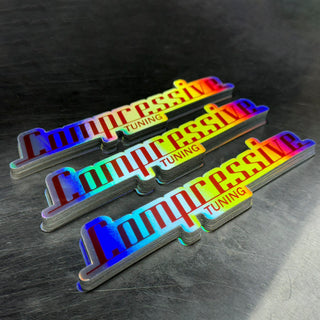 Compressive Tuning Holographic Stickers